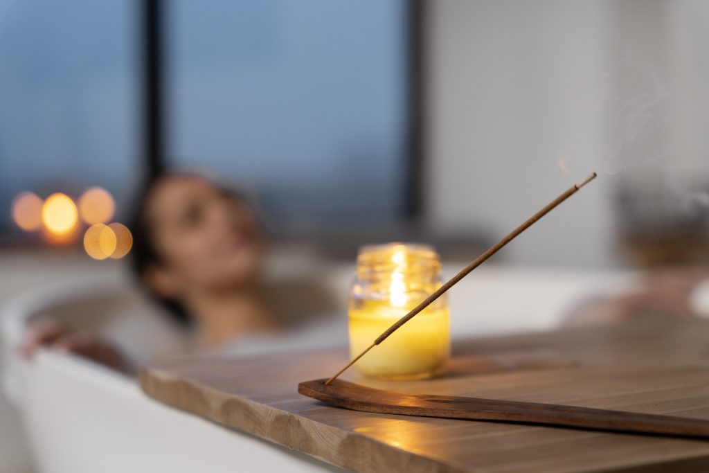 Candle used by woman relax bath