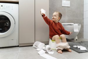Full shot cute kid potty training