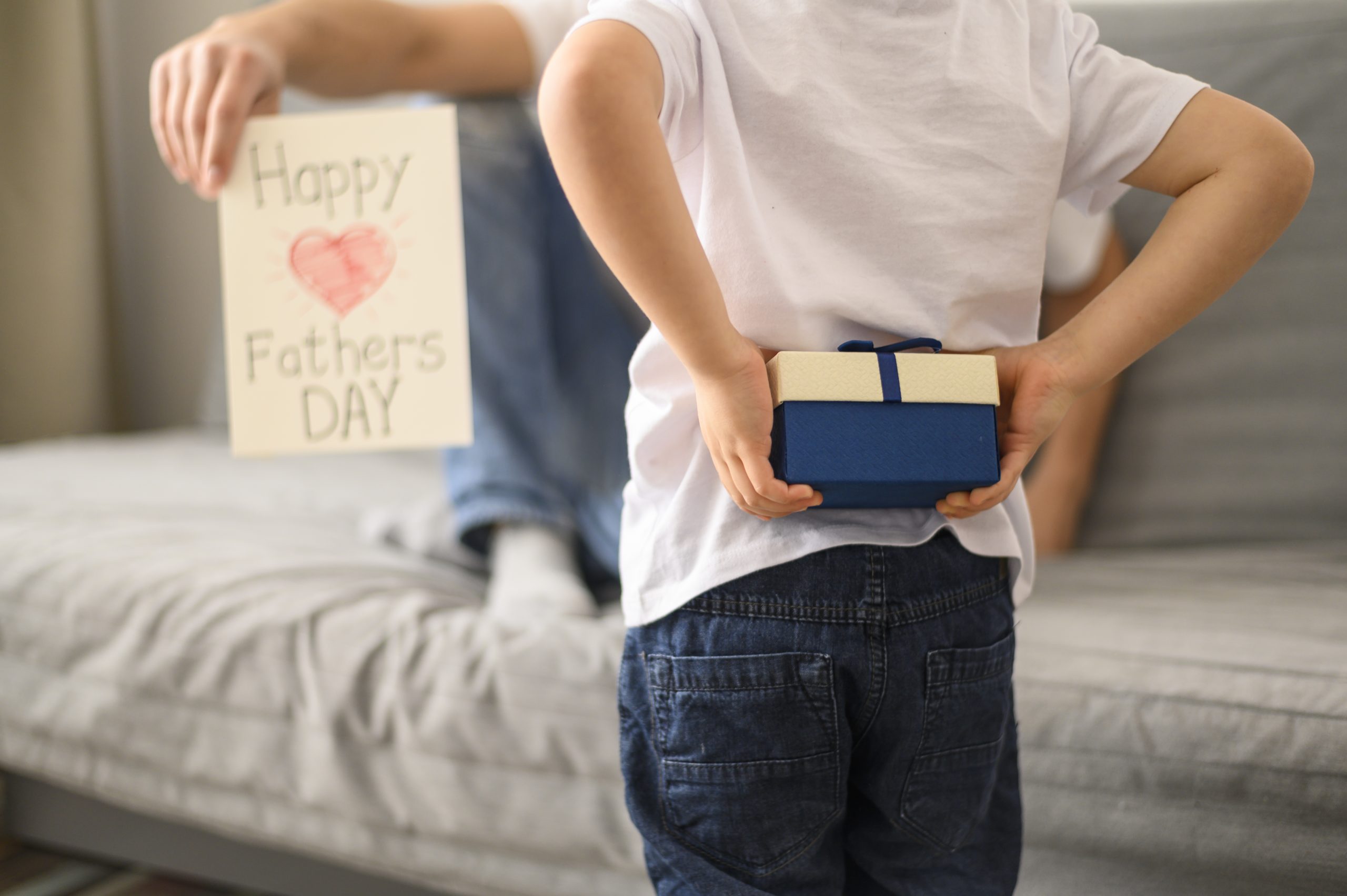 Kid surprising father with gift