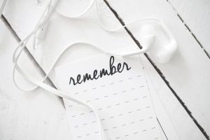 Headphones surrounding word remember
