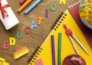 Flat lay notebook with school supplies